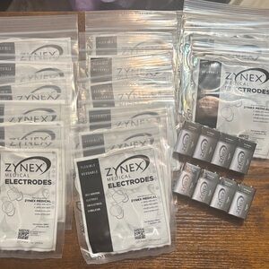 ZYNEX Medical Electrodes for TENS Machine New in Packages w/Battery Replacements